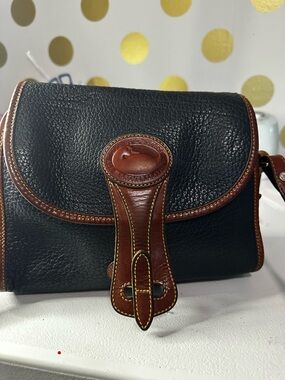 Dooney & Bourke Black Pebble Leather Messenger with Brown Trim